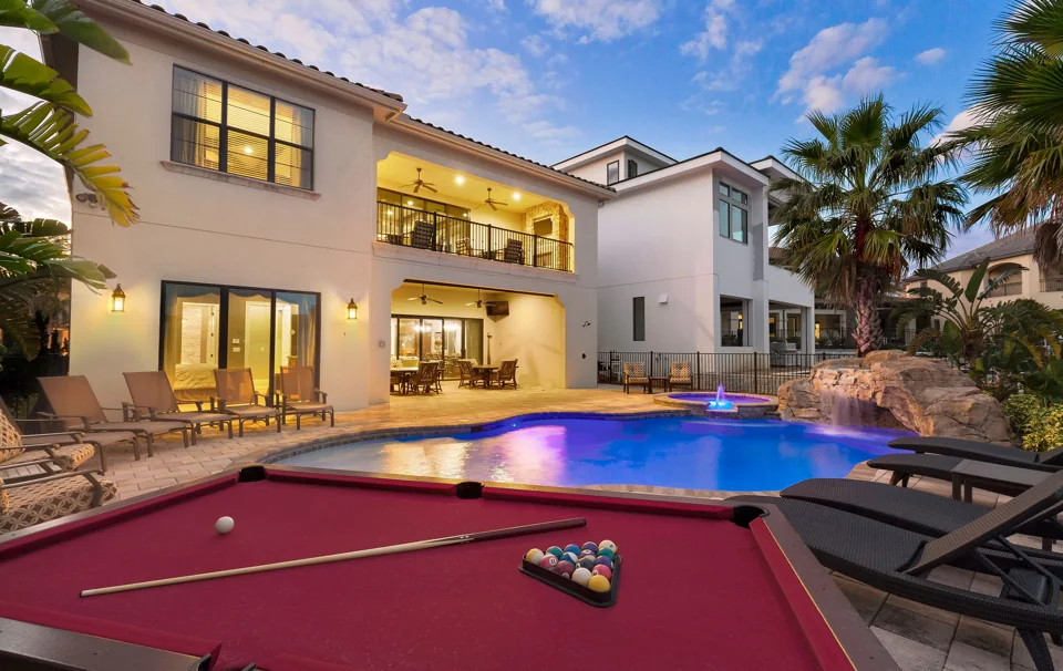 Private pool and outdoor gathering space at a Florida vacation home
