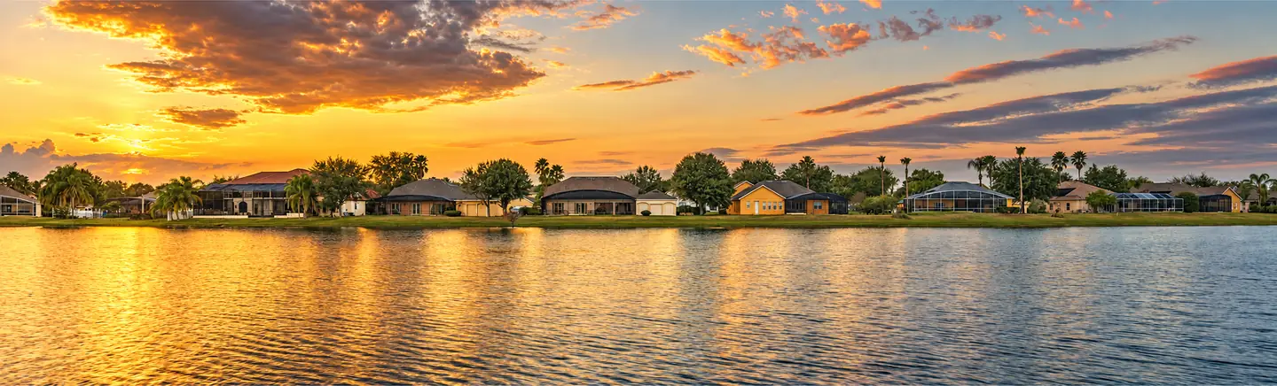 Sunset over the lake and homes at Formosa Gardens