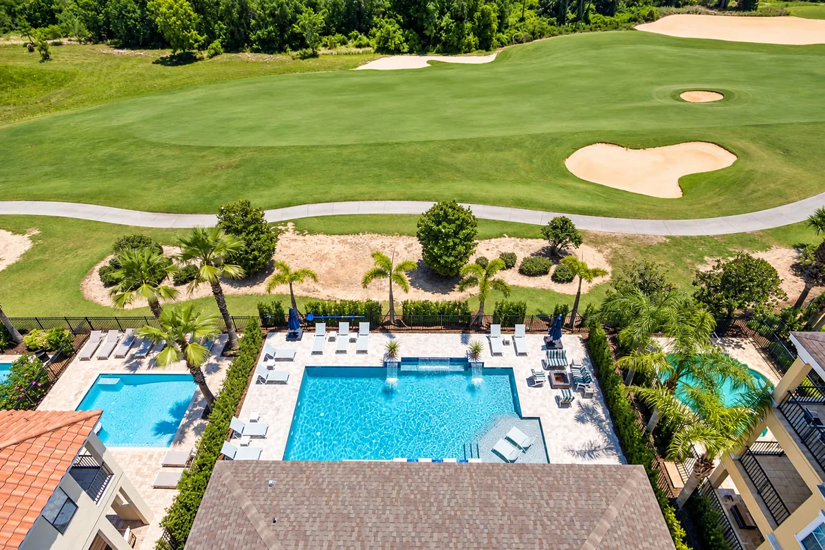 Private villa pool overlooking a golf course