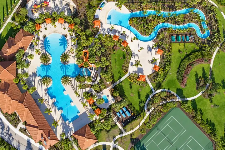Aerial view of Solterra Resort pools, lazy river and tennis courts