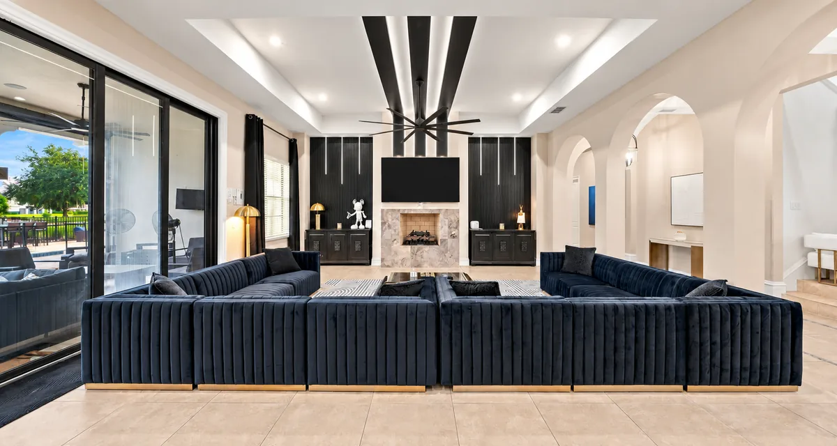 Spacious living room with large sofas for a group stay